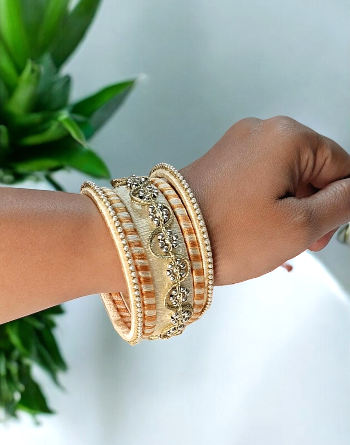 Dhanvi ivory and golden bangles set