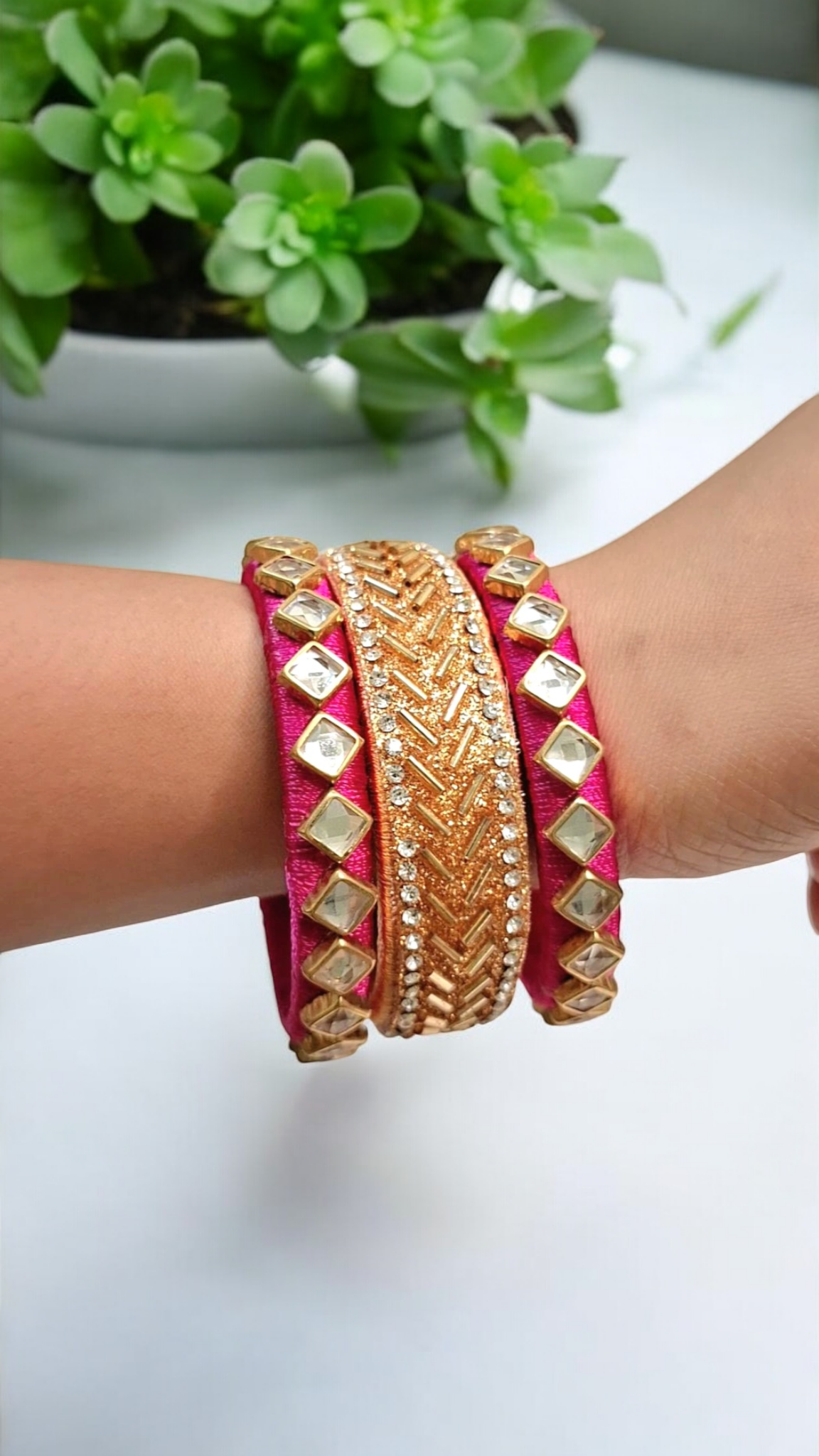 Priyal pink and golden silk thread bangles set