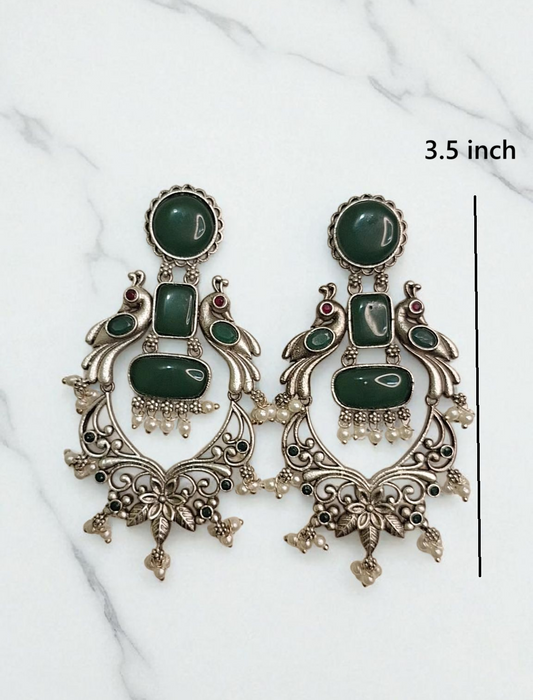 Maura green stone oxidised danglers - premium affordable earrings