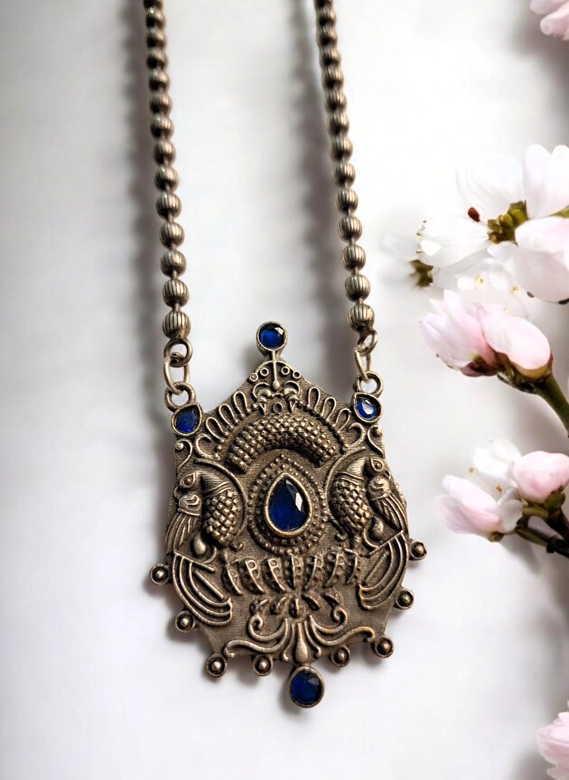 Raga blue stone oxidised necklace