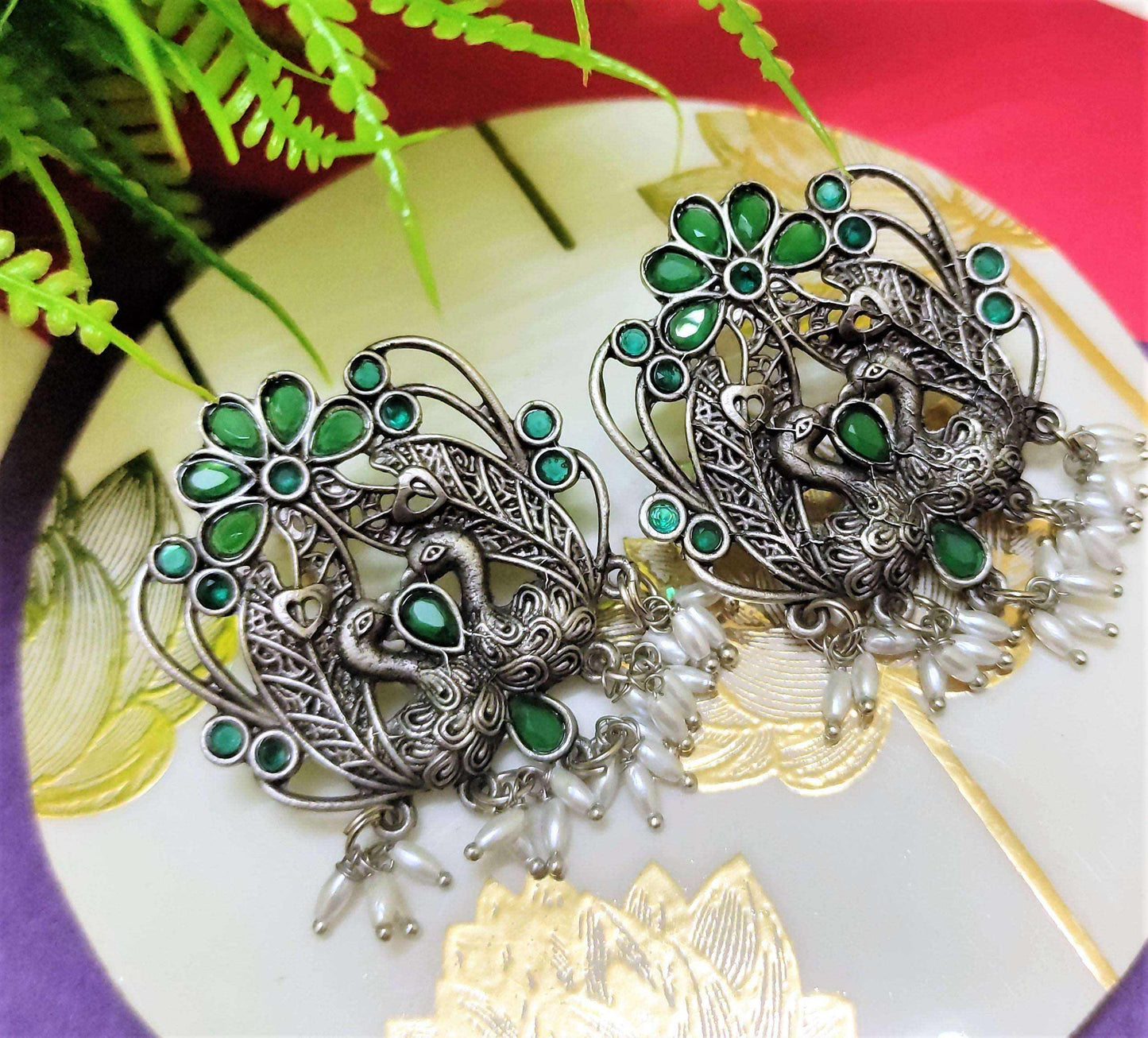 Mayurika green stone oxidised studs