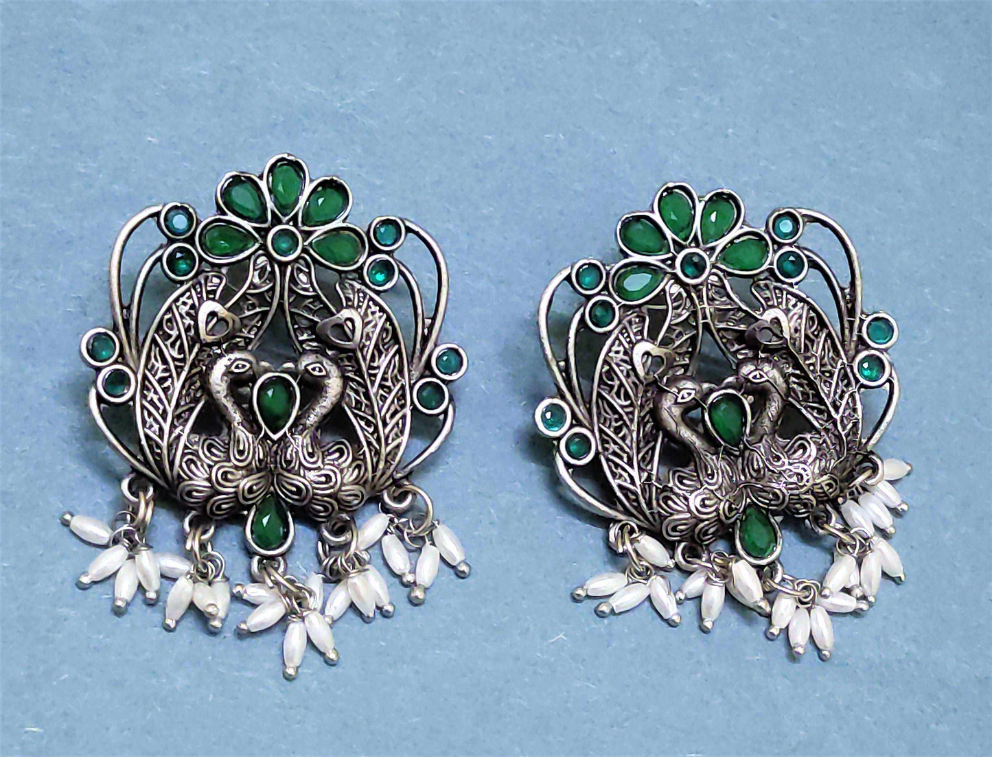 Mayurika green stone oxidised studs