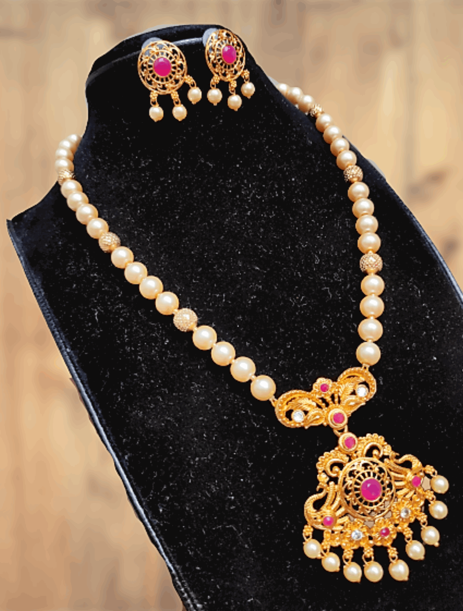 Brinda gold plated faux pearl necklace set