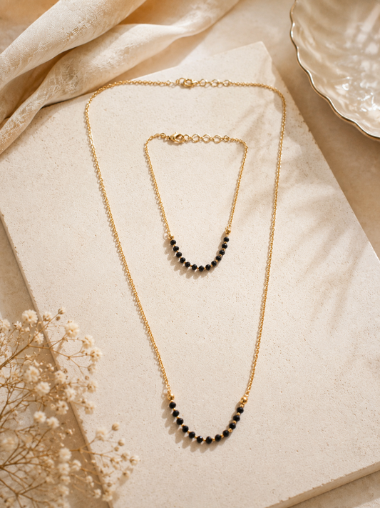 Minimal gold plated mangalsutra and bracelet combo with black beads for modern desi women