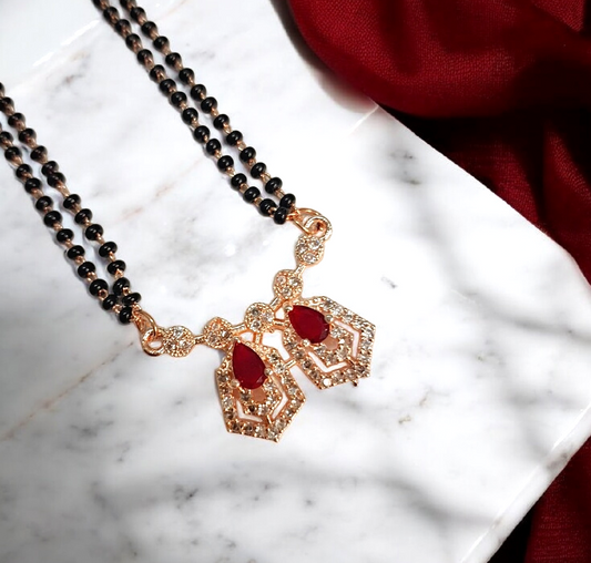 Darshi Ruby hexa - rose gold short mangalsutra featuring ruby red hexagon stone pendant with black beads, modern Indian mangalsutra