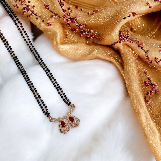Darshi Ruby hexa - rose gold short mangalsutra featuring ruby red hexagon stone pendant with black beads, modern Indian mangalsutra