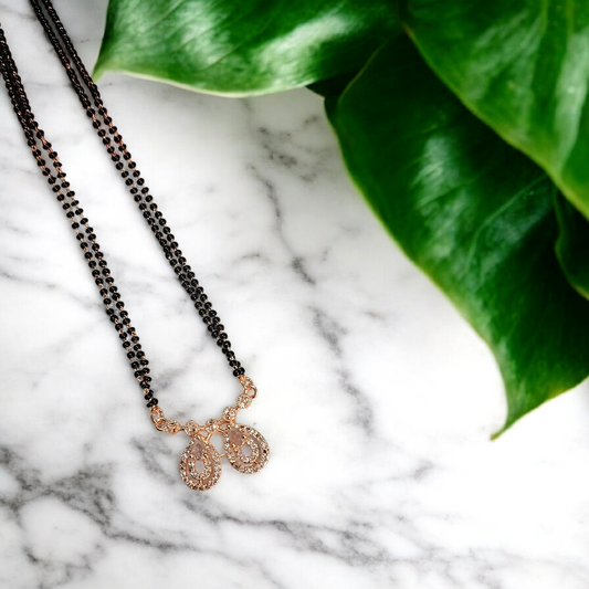 Darshi Teardrop Glow - rose gold short mangalsutra with twin teardrop crystal pendant and black bead chain, elegant everyday mangalsutra