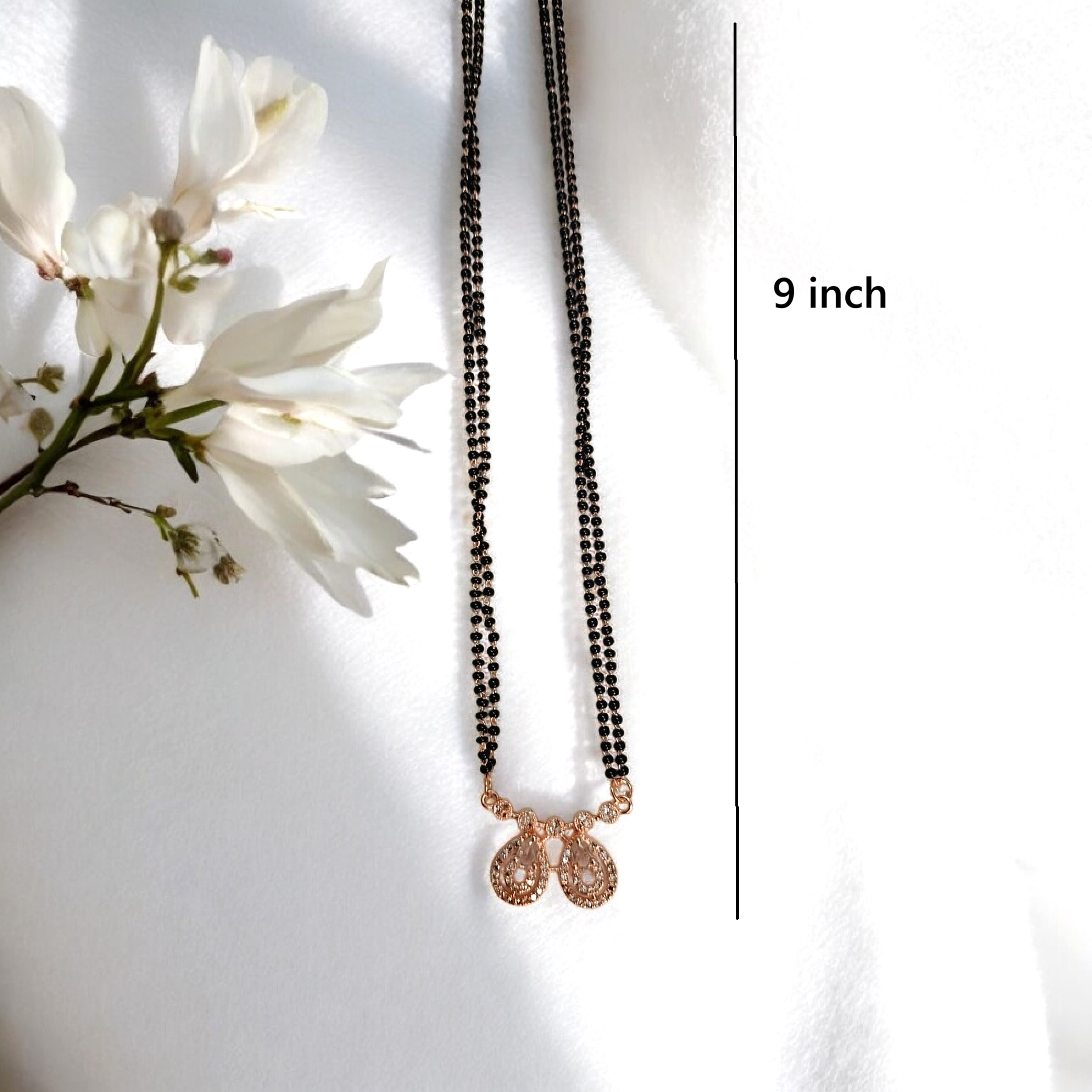 Darshi Teardrop Glow - rose gold short mangalsutra with twin teardrop crystal pendant and black bead chain, elegant everyday mangalsutra
