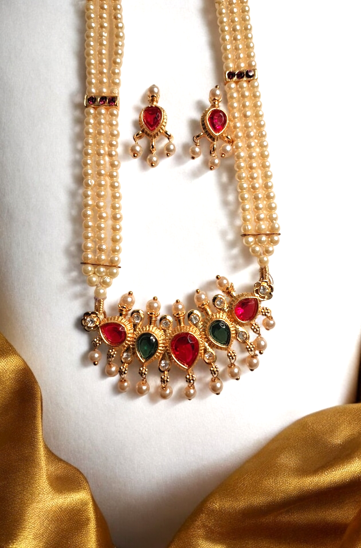 Devangi pink and green stone long tanmani set