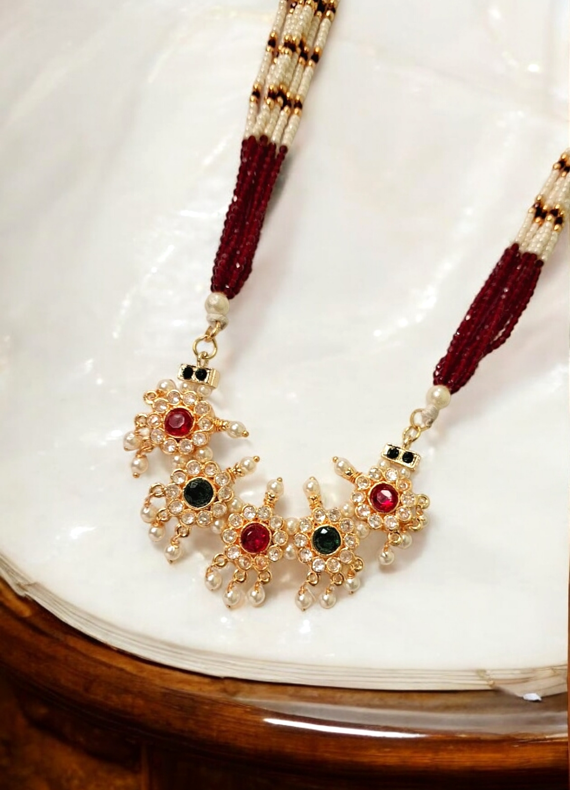 Hemani pink and green stone tanmani set