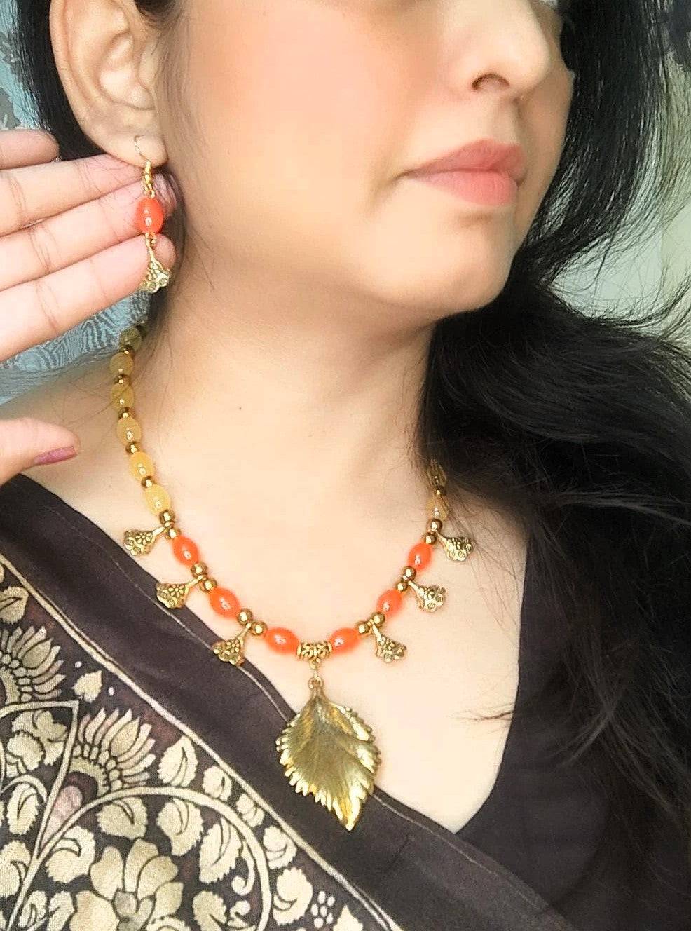 Asma Mirah  orange and yellow beaded oxidised necklace set