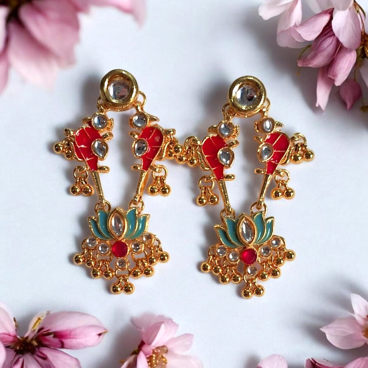 Ithika peacock lotus gold-plated dangler earrings with red and turquoise detailing