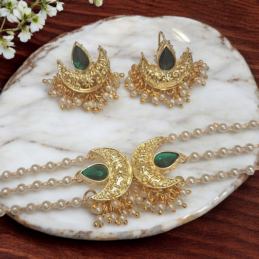 Handmade gold chandbali choker necklace set with green stones and pearl detailing for women in India