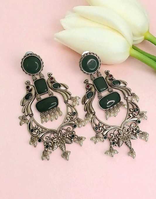 Maura green stone oxidised danglers - premium affordable earrings