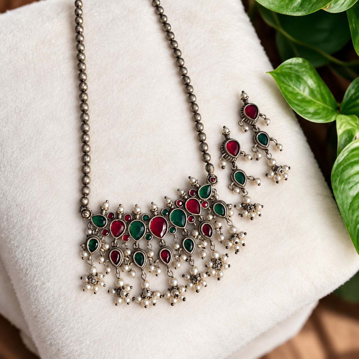 Mugdha Green and Red Stone Silver Oxidised Tanmani set