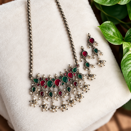 Mugdha Green and Red Stone Silver Oxidised Tanmani set