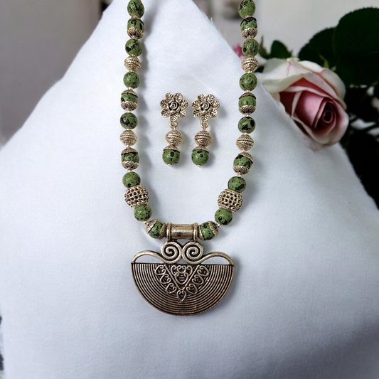 Siara Green Oxidised Necklace Set - green and silver beads with silver oxidised pendent making it a unique tribal inspired jewelry for indian and indowestern attires