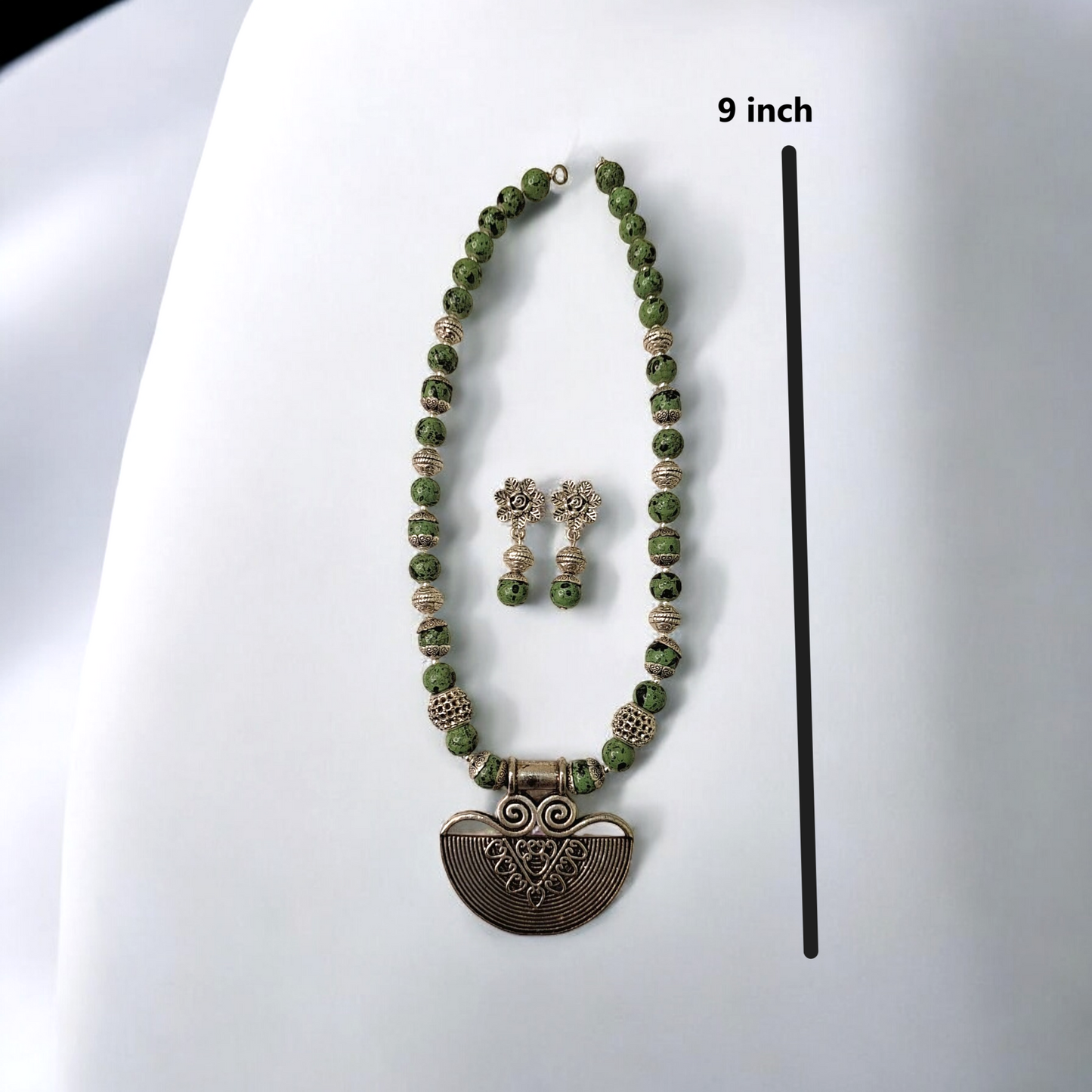 Siara Green Oxidised Necklace Set - green and silver beads with silver oxidised pendent making it a unique tribal inspired jewelry for indian and indowestern attires