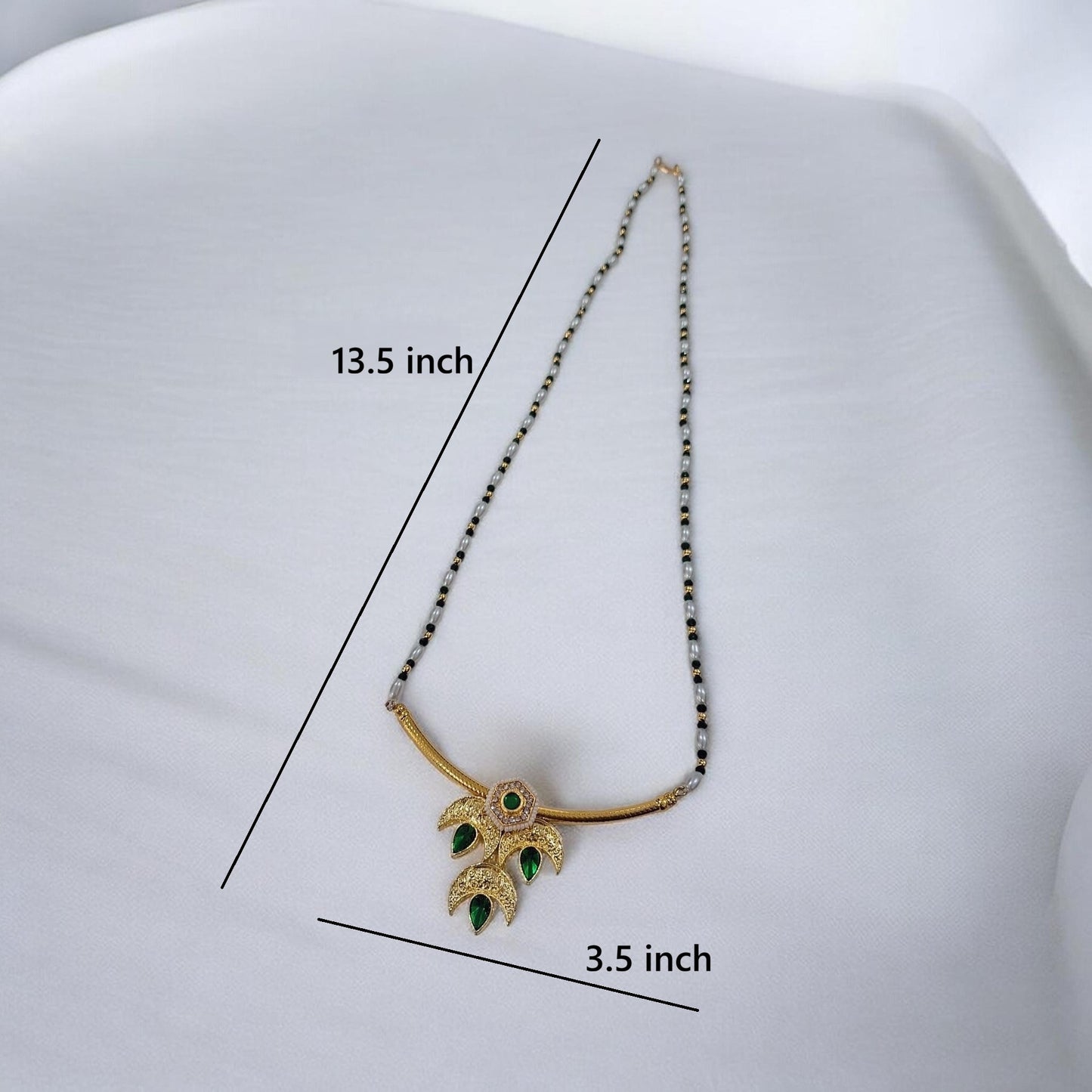 Tarika Chandra gold plated traditional necklace set with green stones and matching earrings with dimentions 13.5 inch long