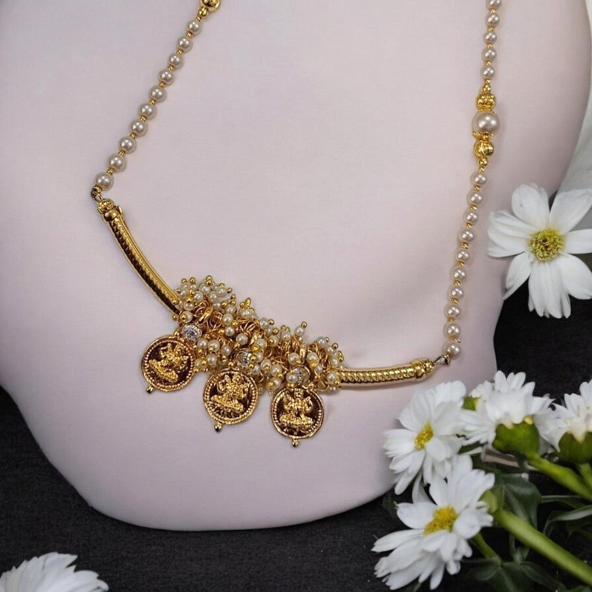 Tarika Shree gold plated Maharashtrian necklace set with Lakshmi coin charms, pearl detailing  by Indiaura Mode